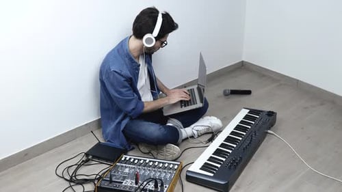 Young Man in Sound Recording Studio