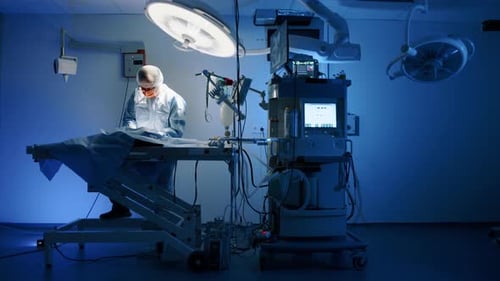 Surgeon Performing Operation in Hospital Operating Room