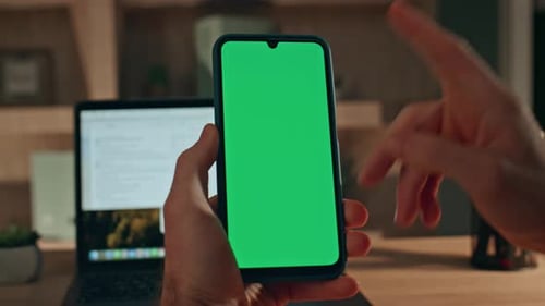 Entrepreneur Swiping Chroma Key Mobile Phone Making Purchase at Home Close Up
