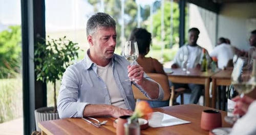 Happy couple, wine tasting and menu with cheers in restaurant for romantic dinner or date together