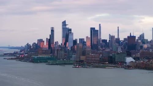 Golden Sunset Light Casting Warm Glow Over Hudson Yards Manhattan Highlighting Skyscrapers and