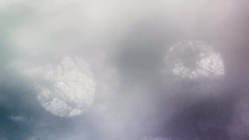 Shimmering Light on Frosted Abstract Background