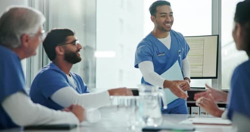 Computer screen, handshake and presentation with doctor team in hospital boardroom for coaching