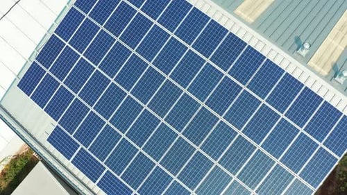 Solar Panels Installed on the Roof the Building Drone View