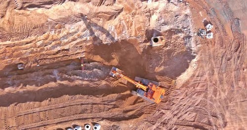 Aerial View of Construction Site with Heavy Equipment