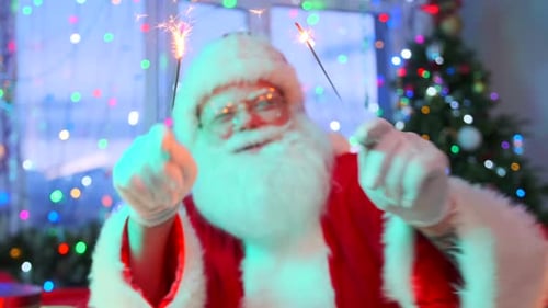 Cheerful Santa Claus Celebrates with Sparklers at Christmas