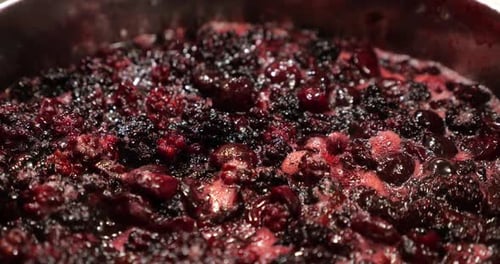 Red Fruit Cooking in a Pot