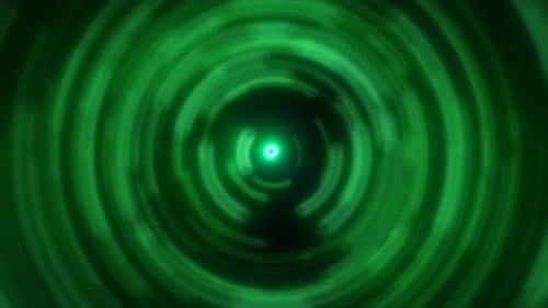 Abstract background of bright green glowing energy magic radial circles of spiral tunnels