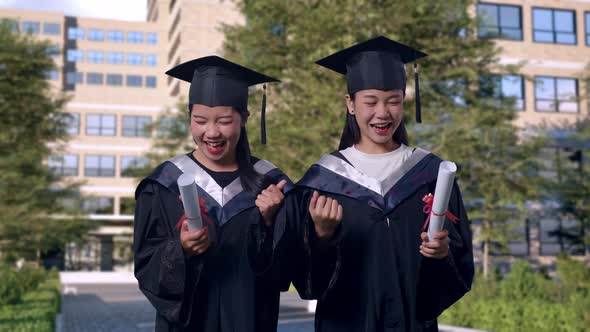 Students Holding Diplomas And Screaming Celebrating Graduation In Front ...