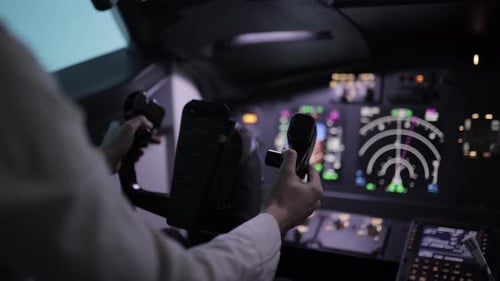 Pilot Controls Futuristic Aircraft in Dark Cockpit
