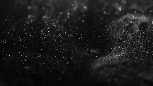 Dark purple textured background cosmic dust particles space nebula night sky stardust glitter abstra