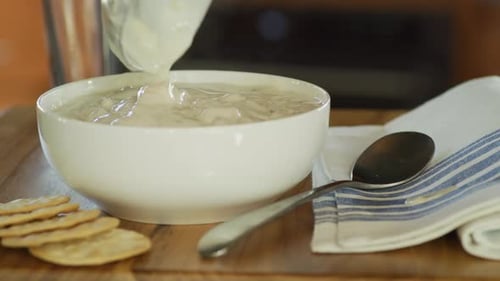 Bowl Of Hot Clam Chowder And Crackers.