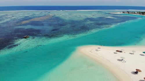 Drone View Of Maldives Beach. Blue Ocean And Sand Beach Aerial