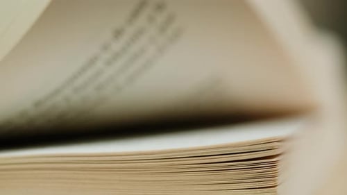 Pages Turning Slowly in a Book Close-Up