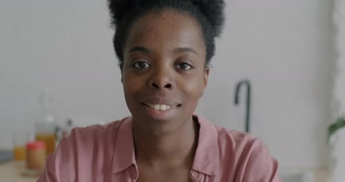 Smiling Woman Close Up Portrait in Kitchen