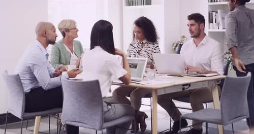 4k video footage of a group of businesspeople having a meeting in a modern office