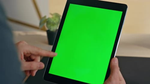 Unknown Businessman Surfing Chroma Key Tablet Internet on Workplace Closeup