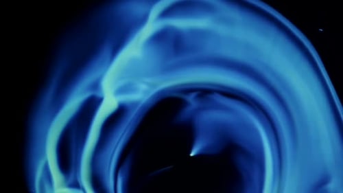 Abstract Swirl of Blue Plasma on Black Background