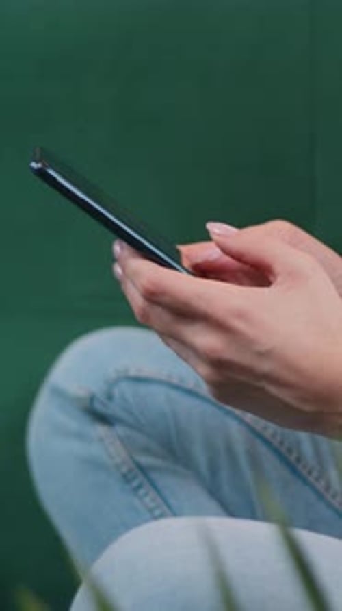 Side View Closeup Hands of Woman Using Smartphone Mobile Social Media Apps Texting Messages Buying