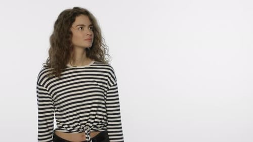 Smiling woman presenting something with open hands