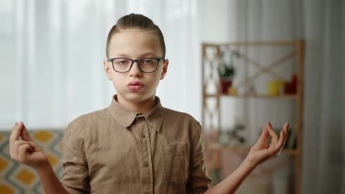 Boy Meditates at Home for Inner Peace
