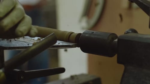 Woodworking on Lathe, Wood Shavings Flying Close Up