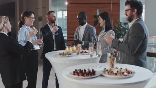 Business Colleagues Toasting Champagne at Corporate Event
