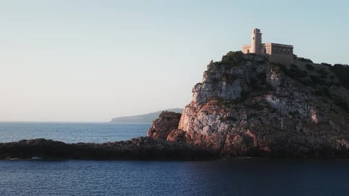Punta Grossa Lighthouse Orbit Revealing Tagomago Island