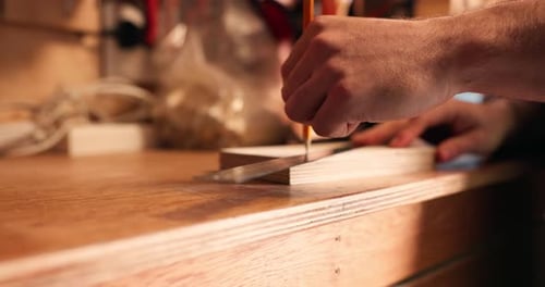 Pencil, carpenter hands and wood to measure line for construction, furniture or project