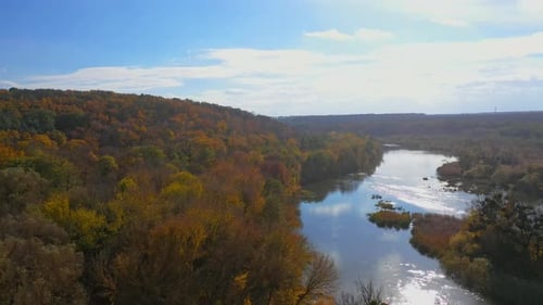 Nature landscape in autumn. Panoramic view of idyllic forest with bright trees in fall season