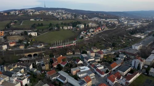 Aerial Footage of the Railroad with a Train Passing By in Bratislava Slovakia