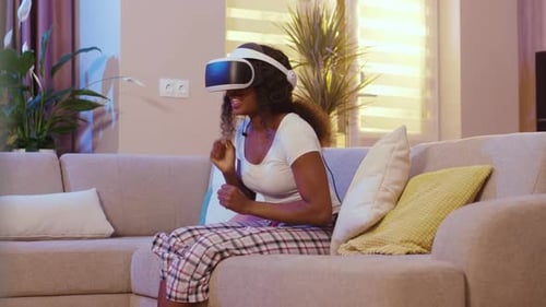 Woman Using VR Headset in Living Room