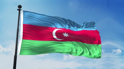 Azerbaijan Flag Waving Against a Clear Blue Sky
