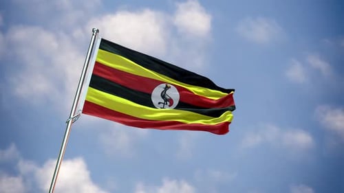 Uganda National Flag Waving in the Wind with Blue Sky
