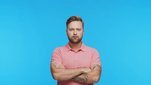 Expressive Young Man Over Vibrant Background Studio Portrait of Handsome Person