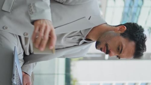Adult Man Working on Laptop and Drinking Coffee