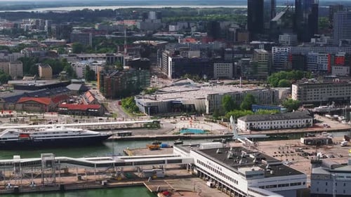 Fly Above Harbor Ferry Transport Terminal on Sea Coast and Modern Town Development in Background