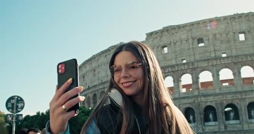 Woman Takes Selfie at the Roman Colosseum