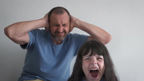 Annoyed Father and Child Screaming Loudly