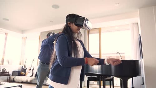 Teen and Adult Enjoying Virtual Reality in Living Room