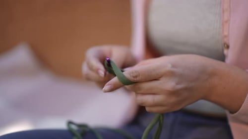 Close Up of Crocheting with Green Yarn