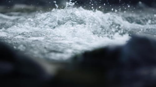 Wild Mountain River Flowing In Slow Motion. Abundant Stream Seething At Stone Rapids. Rapid Water...
