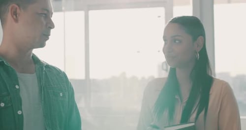 Small Group Chatting in a Bright Office