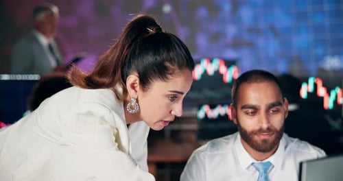 Man, woman and trading in discussion at office with pc, planning and advice with investment on stock