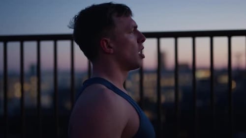 Man Doing Abdominal Breathing At The Rooftop