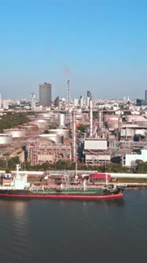 Industrial landscape of Bangkok showing shipping and storage facilities