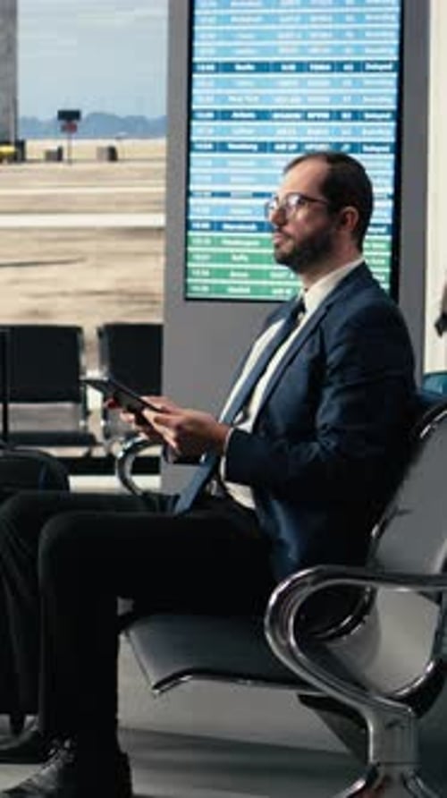 Vertical Video CEO Professional at the Airport Terminal Lounge Global Business Trip