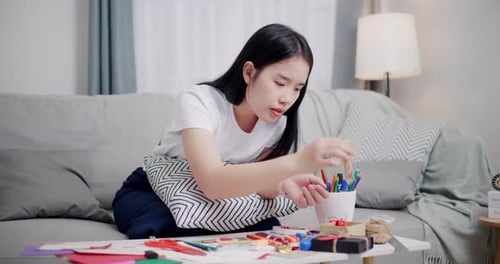 Woman crafting at home