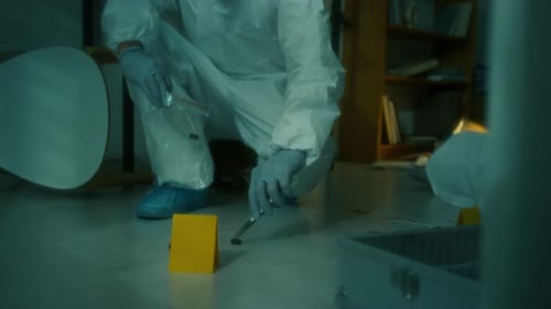 Collecting Crime Scene Evidence in Protective Suit