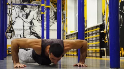 Strong Sporty Athlete Doing Different Types of Push Ups at Modern Gym Young Sportsperson Showing